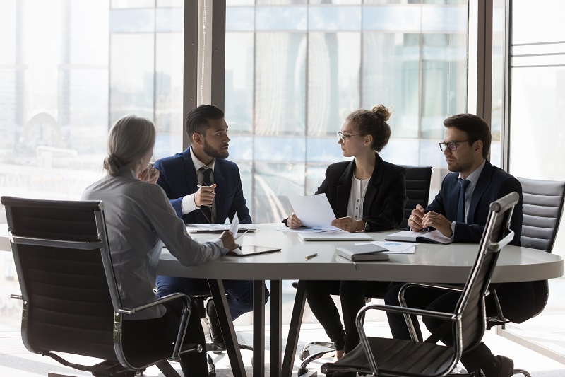 Group of in-house attorneys in a meeting