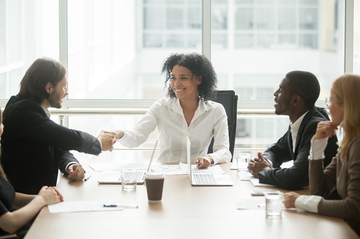 Successful legal team having a meeting in a boardroom